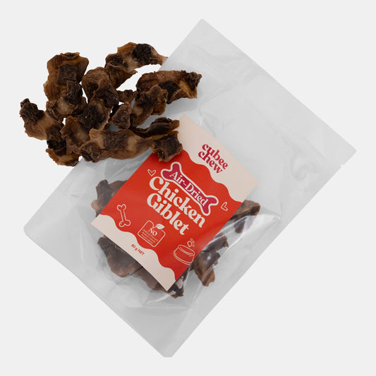 Air-dried chicken gibelet treats with a packaging label on a white background