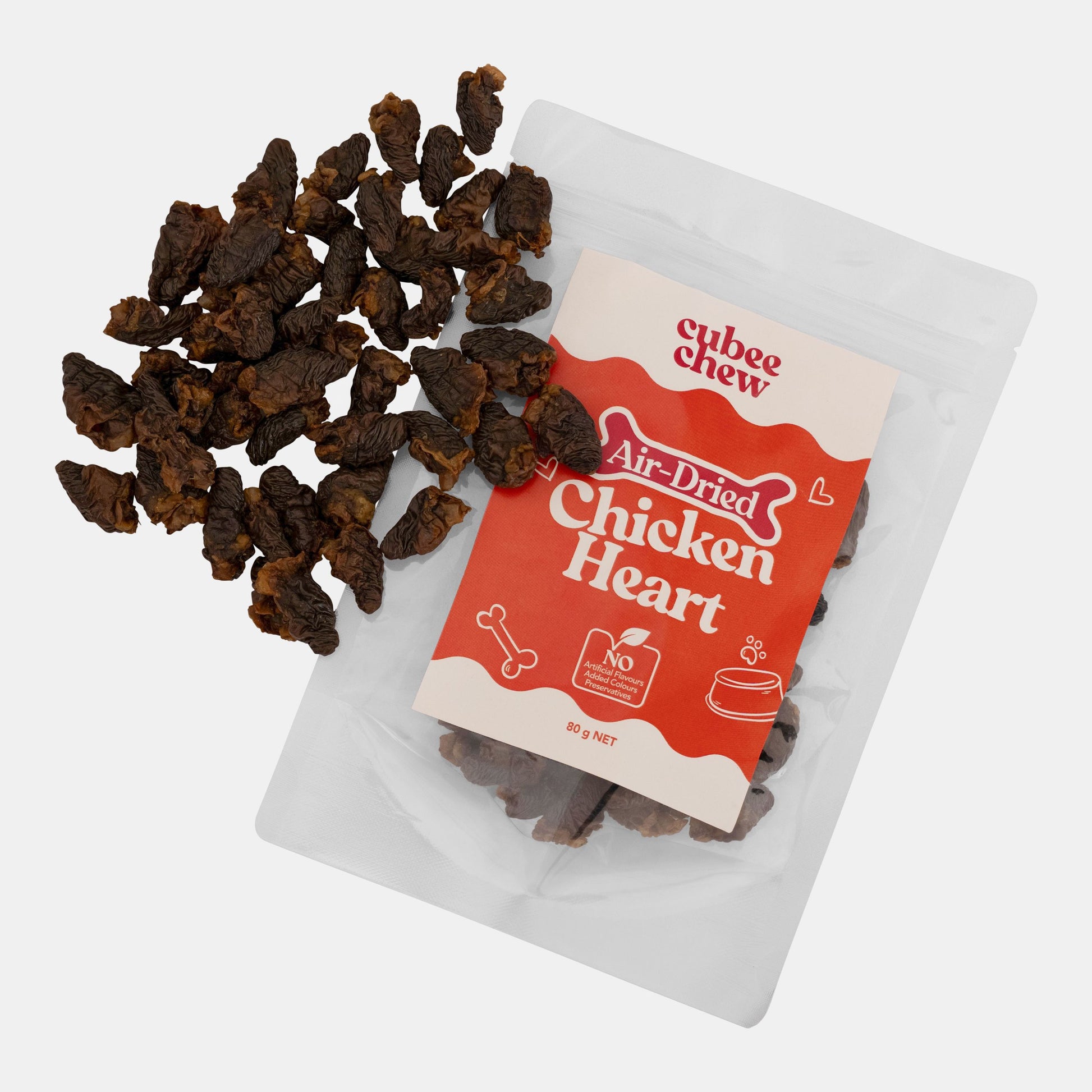 Air-dried chicken heart treats and their packaging on a white background
