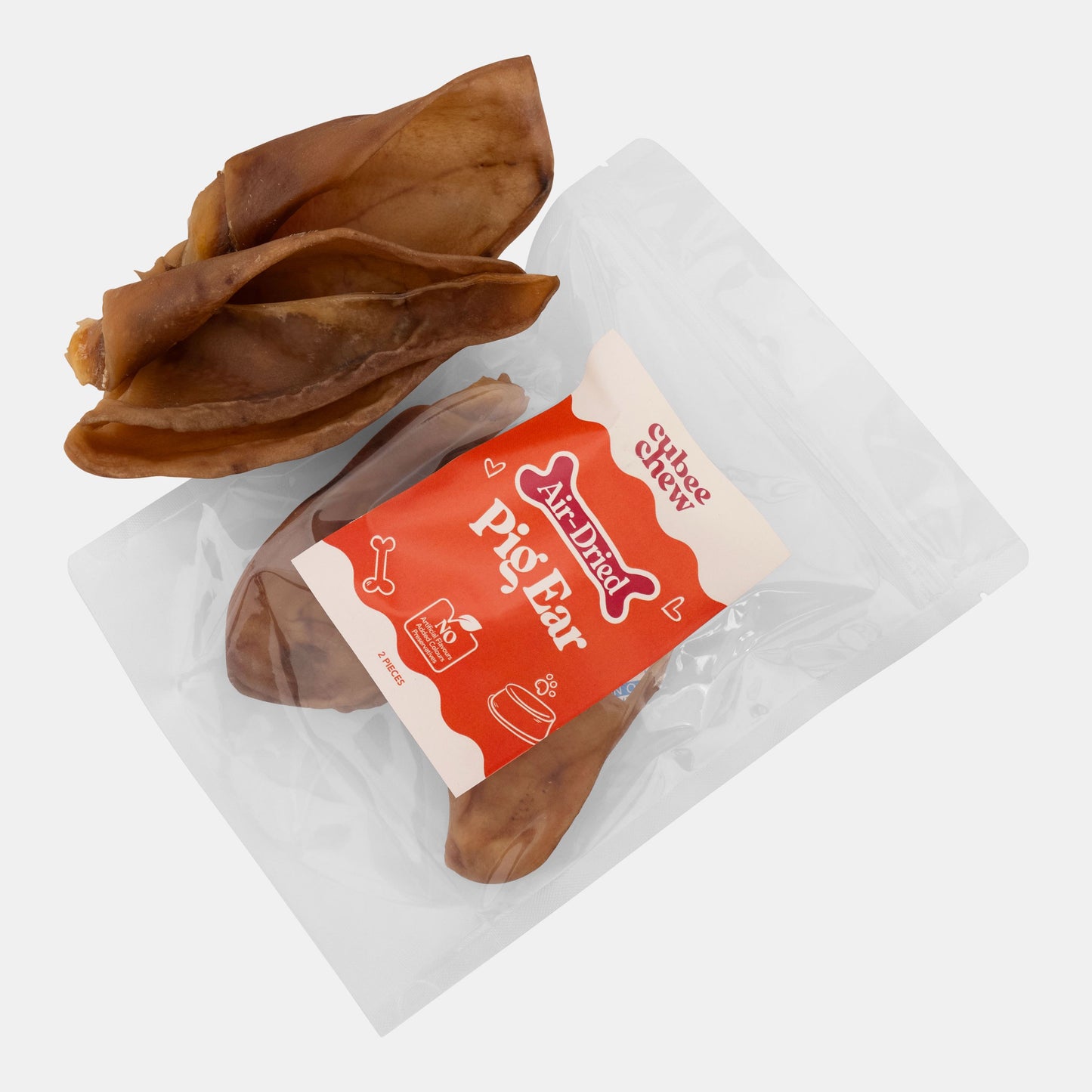 Dried pig ears with a package labeled 'Allied Pet' on a white background